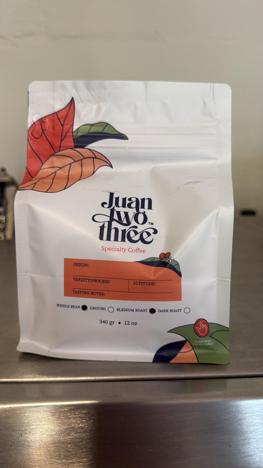 Juantwothree Grano single-origin Colombian coffee bag, front