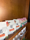 Juantwothree Grano and Special Blend Miami coffee bags